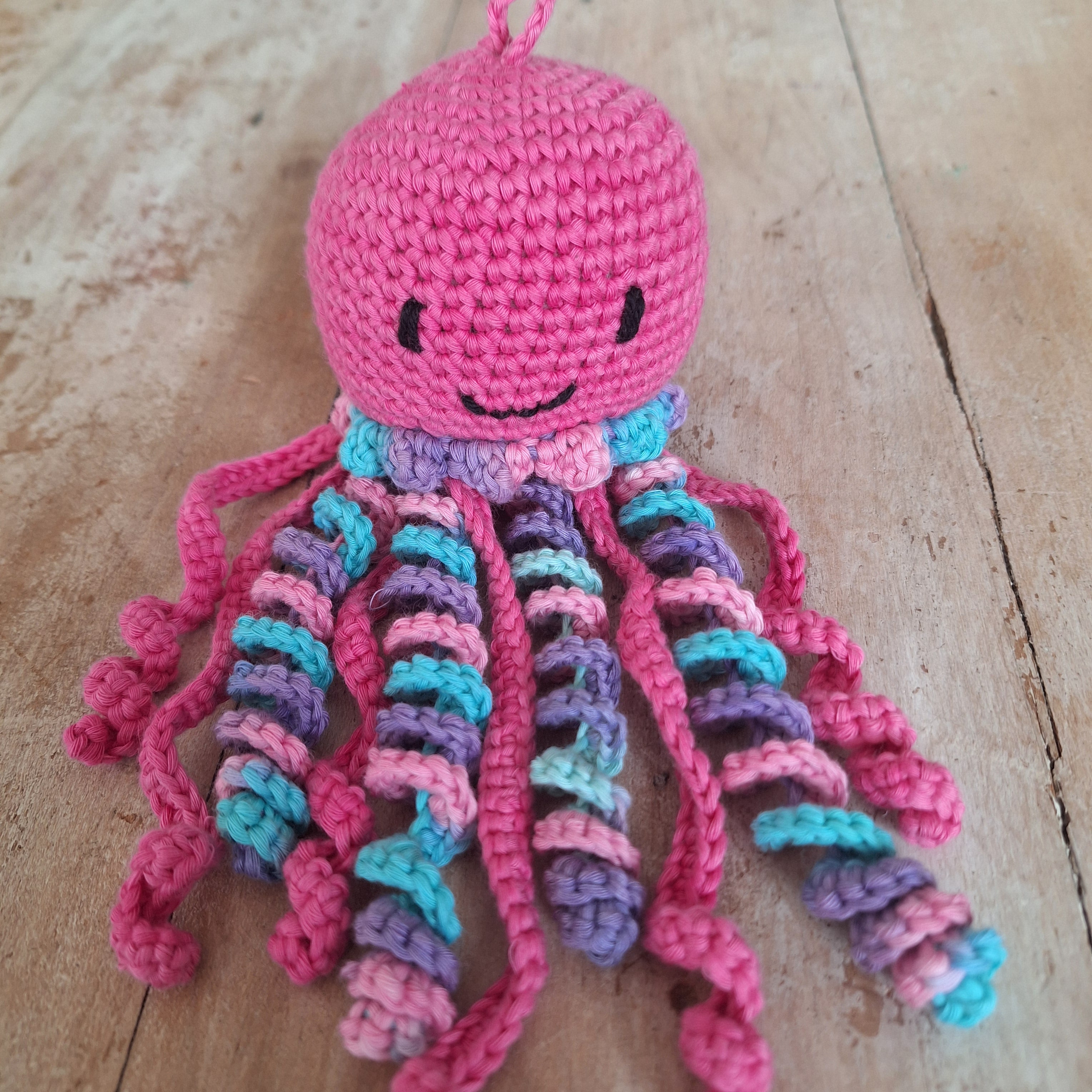 Medusa de apego fucsia