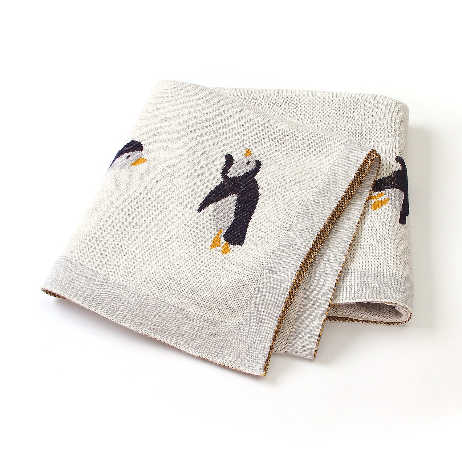 Manta Tejida Pingüino Crema